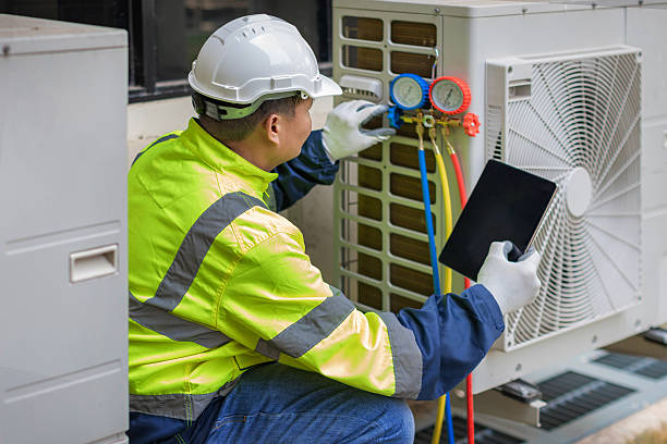 Professional Air Duct Cleaning technician working in Hyde Park, MA